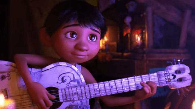 Miguel och hans gitarr i Coco